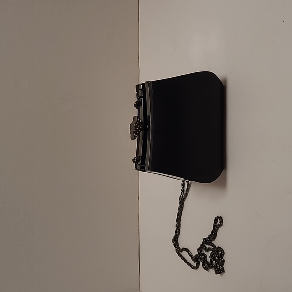 Jessica McClintock black satin evening cluch kiss lock. With chain.